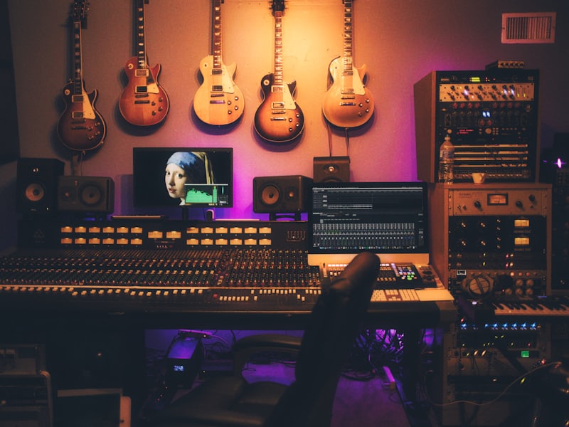 A producer editing a tour recording in the studio